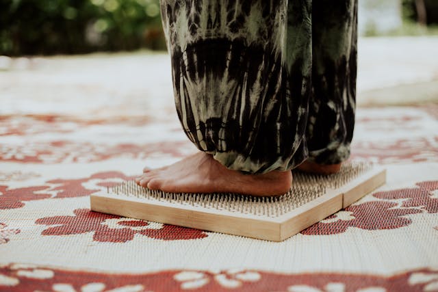 Image showing girl standing on acupressure mat